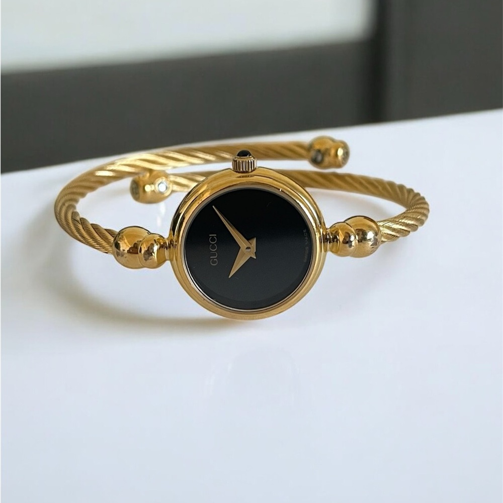 Vintage Gucci Women's Gold and Black Twisted Bracelet Watch